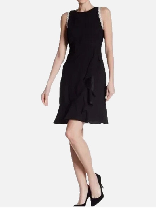 Nanette Lepore Dresses & Skirts - Nanette Lepore Black Sleeveless Ruffle Dress with Lace Trim